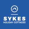 Sykes Cottages logo for DCTAW